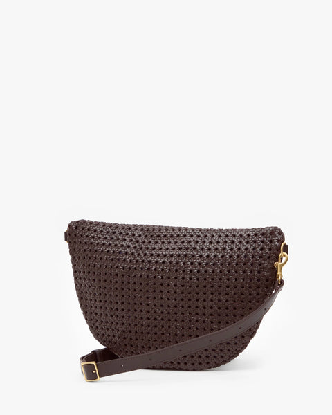 Close-up of Clare V chocolate rattan woven leather texture on Grande Fanny – artisan rattan leather bag detail