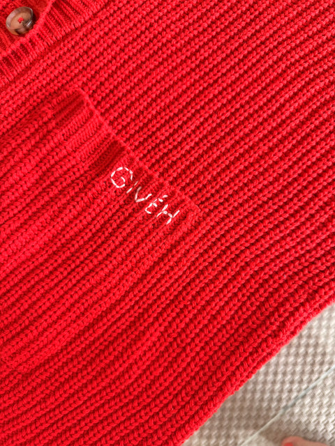Givéh Red Coco Cardi – bold red oversized cardigan, button-through styling, lifestyle shot