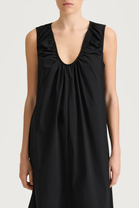 close Front view of the Jaisie Dress, a soft cotton blend midi dress featuring a U-neckline and gentle gathering for a flowing silhouette.