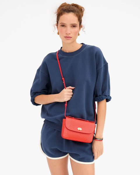 Clare V Kathryn Bag Red Lizard - Side View Highlighting 2-Inch Depth and Structured Italian Leather Silhouette