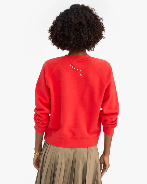 Signature red sweatshirt with Pas Mal text on front. Made from 100% cotton. 
