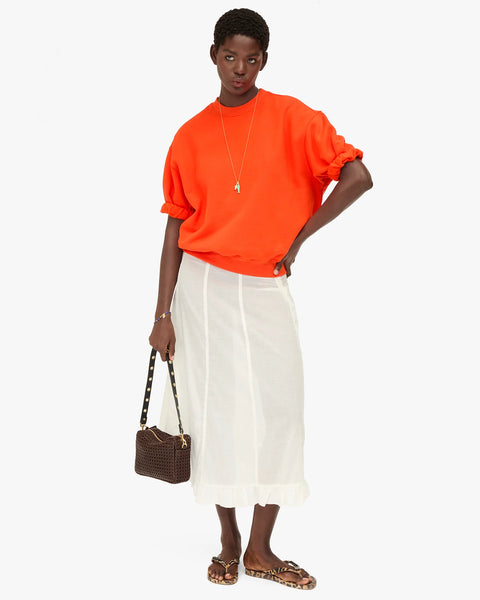 Front view of Clare V chocolate rattan Midi Sac – soft unlined rattan woven leather purse with 45.5" crossbody strap