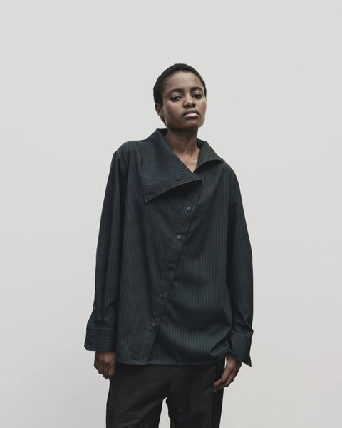 Asymmetric Striped collar Shirt in navy by Mijeong Park. exaggerated funnel neck and asymmtrical button front - big and baggy oversized fit
