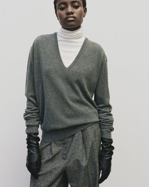merino wool, blended with a touch of cashmere for an extra-luxe fabric, relaxed fit, v-neck, long sleeve sweater ribbed trim
