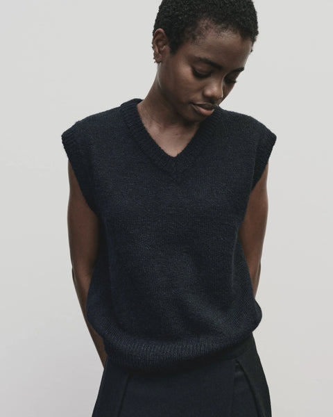 Classic sweater vest, in a relaxed oversized fit, wool blend, V neck with ribbed trims. Mijeong Park Wool Blend V-Neck Vest in  Navy
