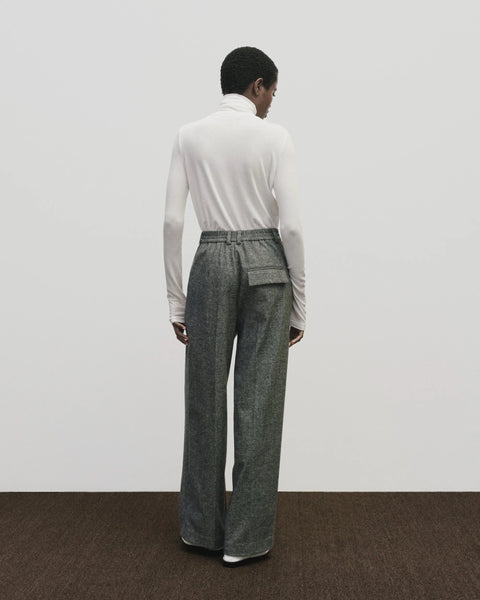 High waisted grey trouser pant in a wool blend. Pleats on the front, and side seam pockets. Mijeong Park Wool Blend Wide-Leg Pant in Grey
