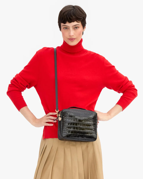 Clare V Mirabel Black Croco crossbody bag – open interior showing chambray lining and organized pockets