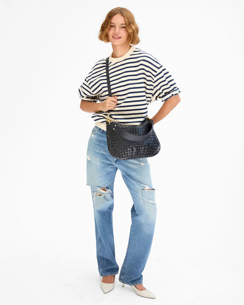 Clare V Moyen Messenger Twilight Navy - side profile of zip-top crescent bag, 15" wide 100% leather