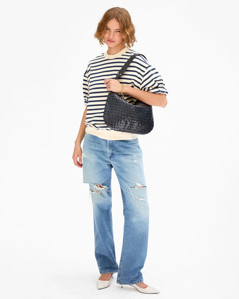 Clare V Moyen Messenger Twilight Navy - open interior showing chambray lining and interior pocket