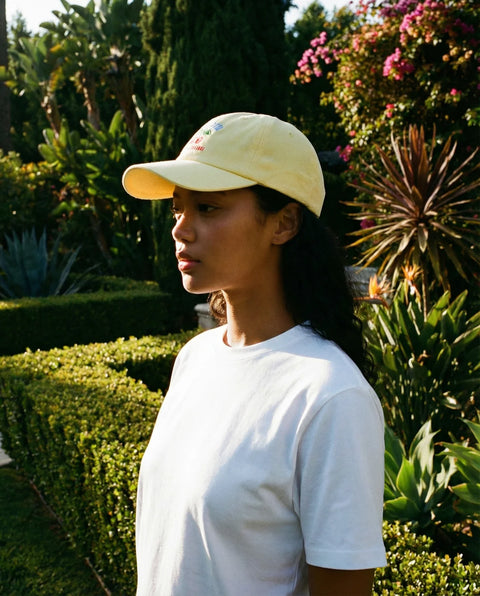 On Vacation Cherry Cap Pastel Yellow - Side Profile Showing Curved Brim and Relaxed Cotton Fit