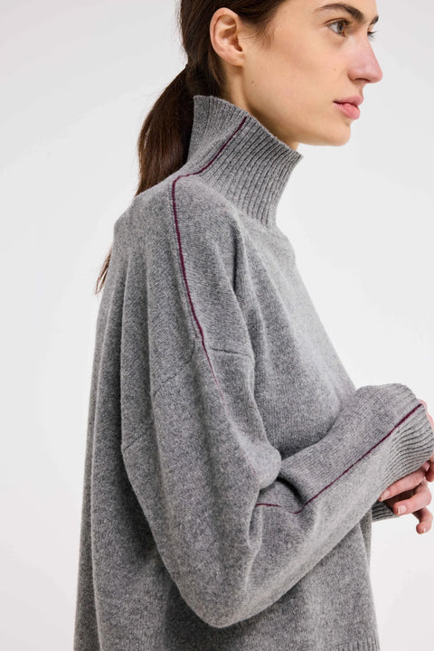 High neck, turtle neck sweater with ribbed fabric, made of 100% wool. Knit sweater women, piping down arm. Made by Our Sister 
