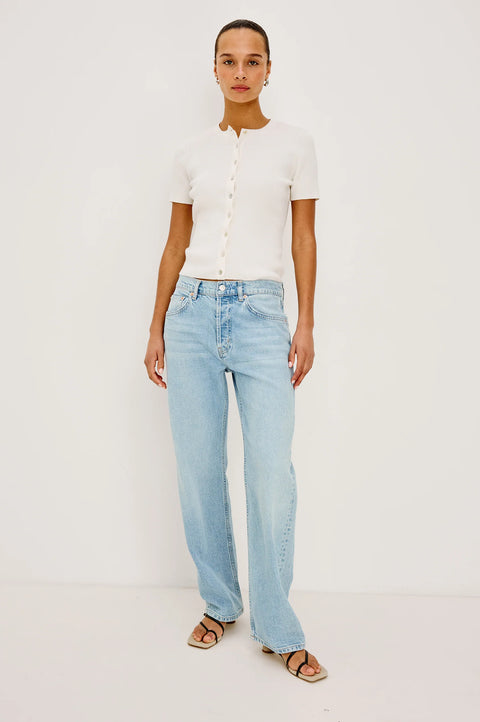 Ivory ribbed knit button front top full outfit styled with jeans