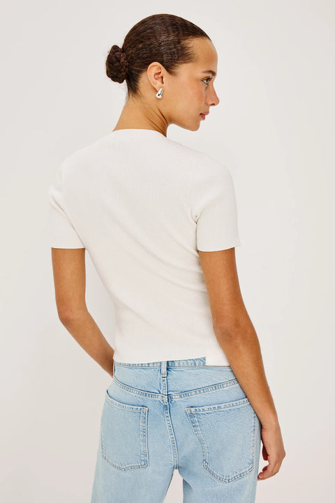 Ivory ribbed knit top back view fitted silhouette
