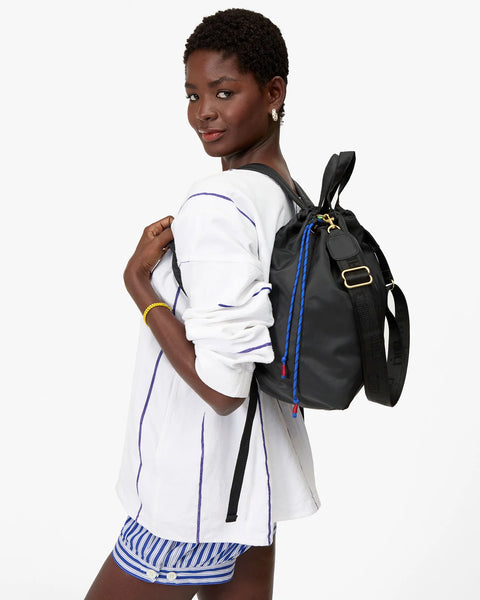 Clare V Sac Tout Backpack Black - Side View Highlighting Compact Structured Shape and Recycled Nylon Fabric