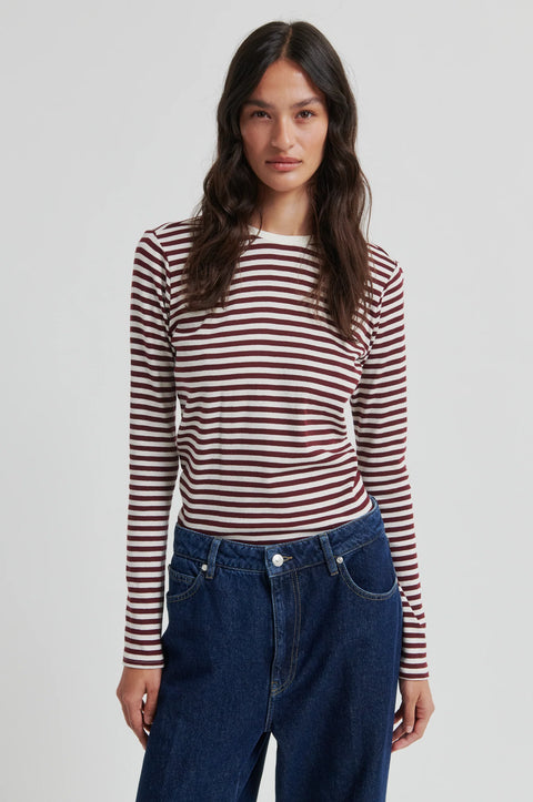 100% cotton, round neck, and long sleeve with twin needle stitching, in brown and white stripe. 
