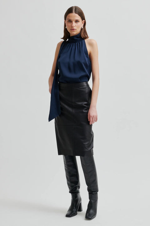 Silky sleeveless blouse in navy blue with the high neck colour with a side tie. Second Female Kura Top 

