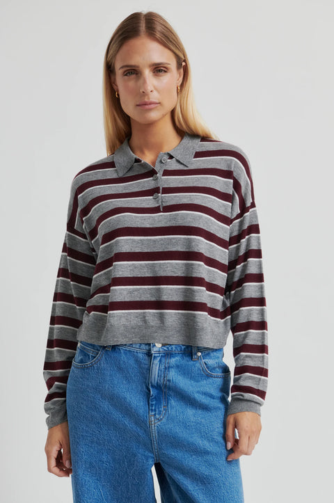 Classic rugby shirt, with boxy stripe grey and brown. Merino blend with a polo collar, half-button placket, and ribbing at the collar, cuffs, and hem. Cut short but not cropped, in a slightly relaxed fit.
