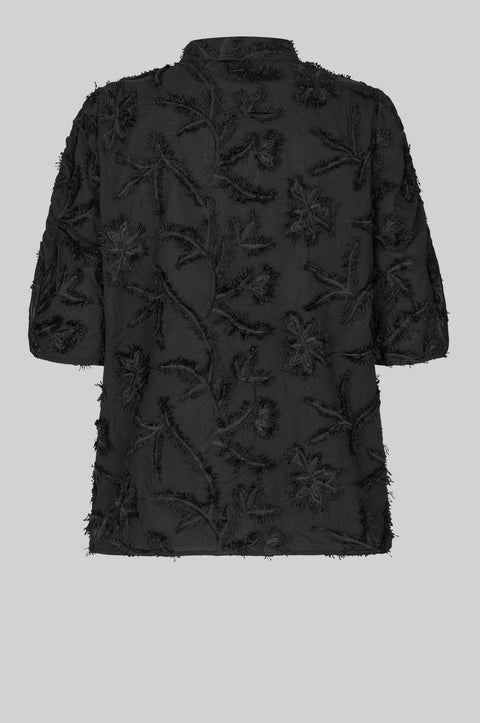 Textured leaf pattern short sleeve cotton sweater in black, button-through placket, and short sleeves with an elastic, ruched detail.
