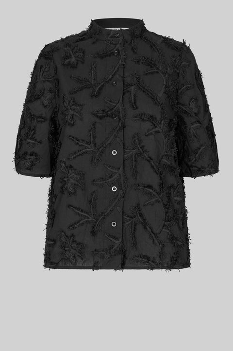 Textured leaf pattern short sleeve cotton sweater in black, button-through placket, and short sleeves with an elastic, ruched detail.
