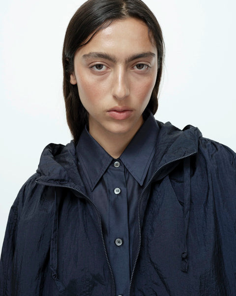 Navy anorak jacket close up fabric and shirred detail