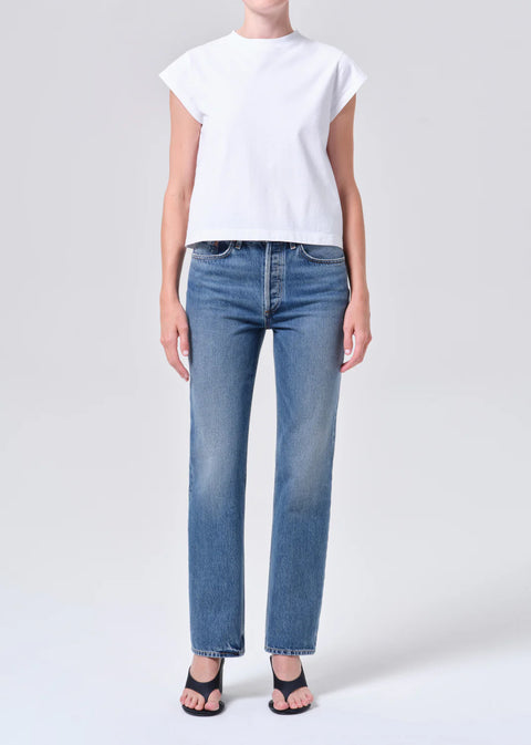 AGOLDE Lana relaxed straight leg jean in Liberty, a medium tinted indigo wash crafted from non-stretch regenerative cotton denim.