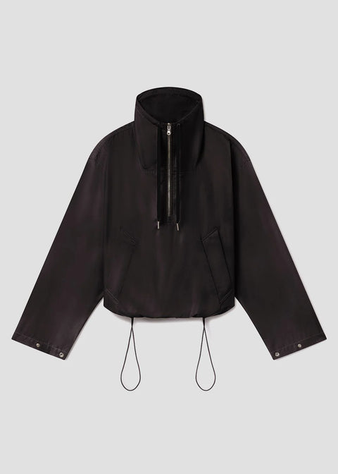 AGOLDE Lydia anorak in black, featuring a three-quarter zip, high collar, and a relaxed cropped fit in breathable lightweight nylon.