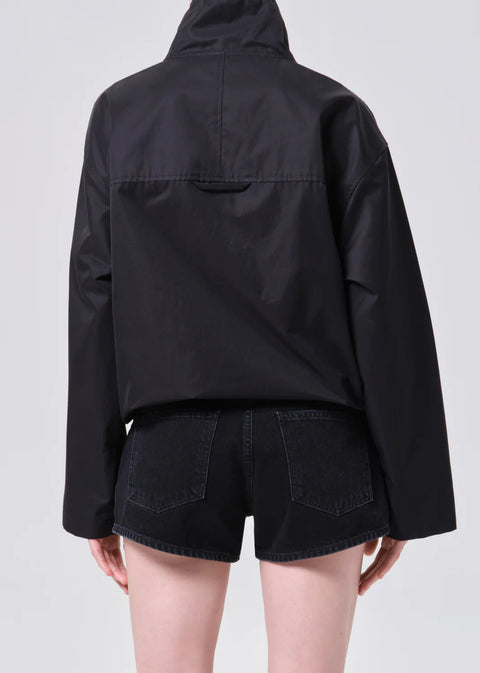 AGOLDE Lydia anorak in black, featuring a three-quarter zip, high collar, and a relaxed cropped fit in breathable lightweight nylon.