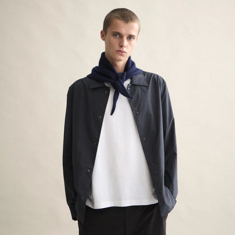 Le Bonnet Bandana in Midnight — styled as a loose neckerchief