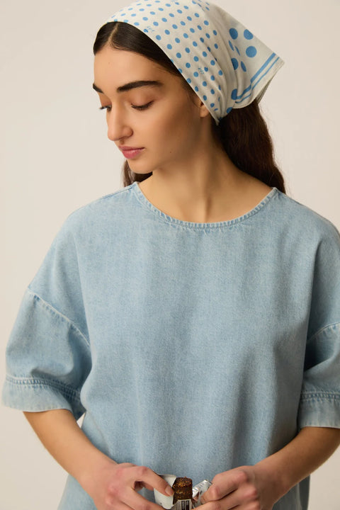 Des Petits Hauts Loris oversized denim t-shirt in bleached blue cotton with a relaxed fit and shirttail hem.