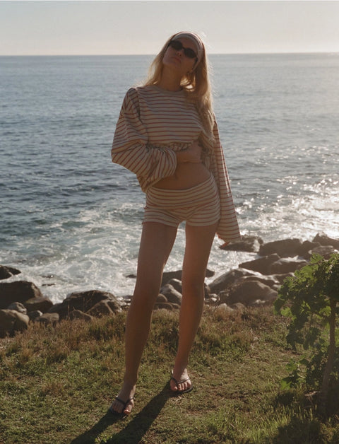 Apres June cream with blue and raspberry stripe tee on model – relaxed fit multi-stripe layering top